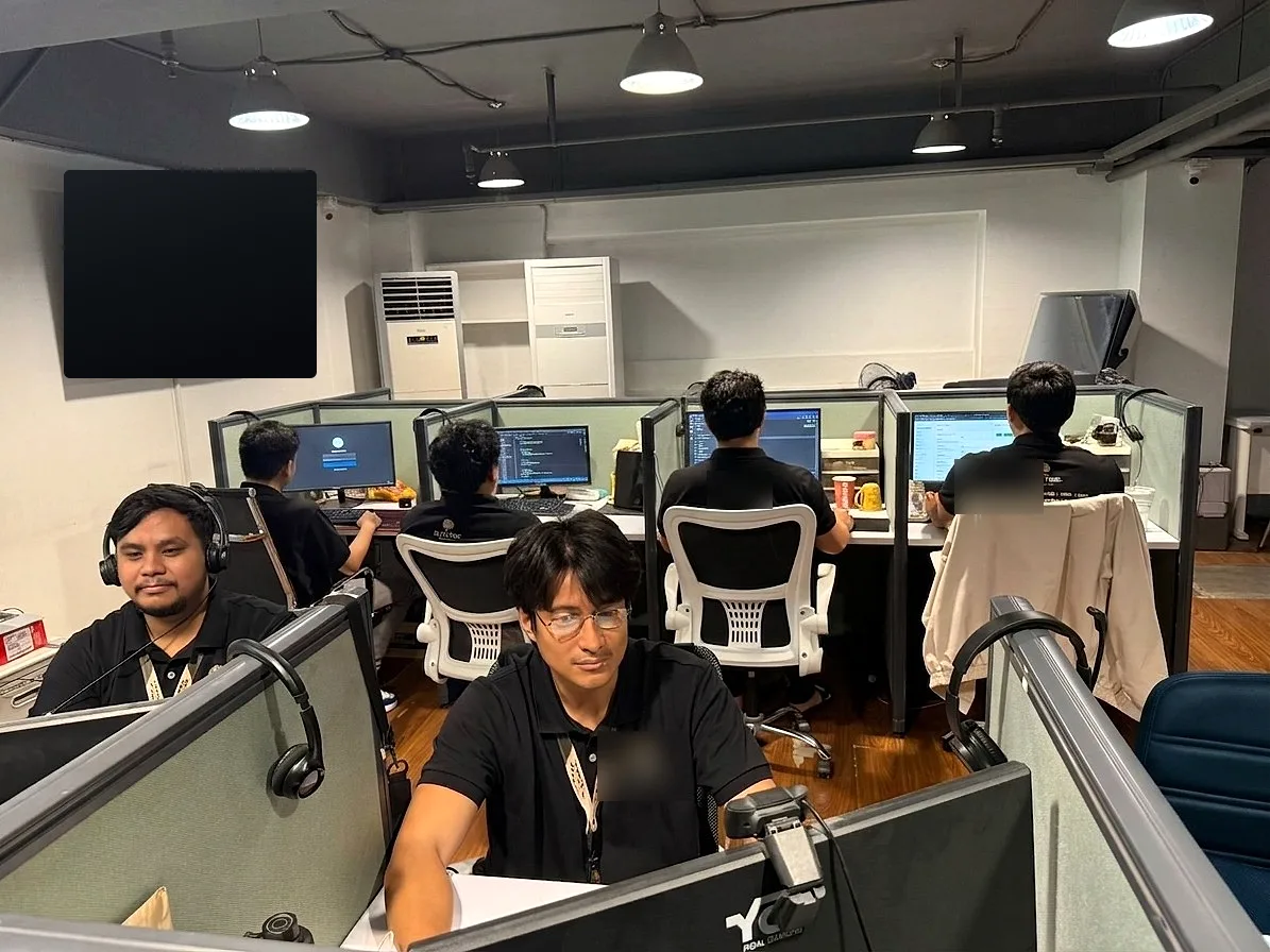 BuildNextTeam developers at their workstations in the Bohol office